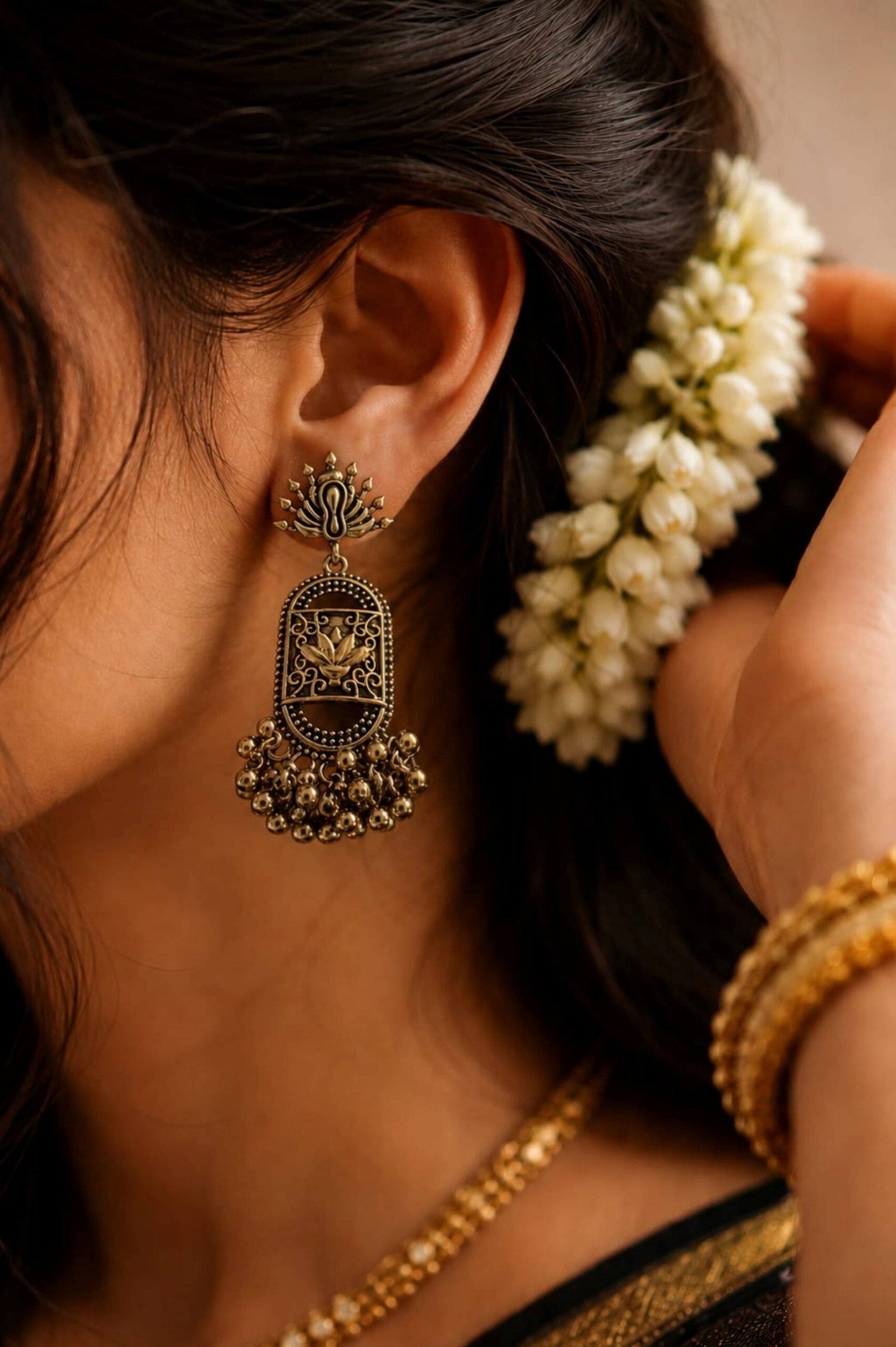 EROS - Golden Oxidised Floral Tassel Earrings